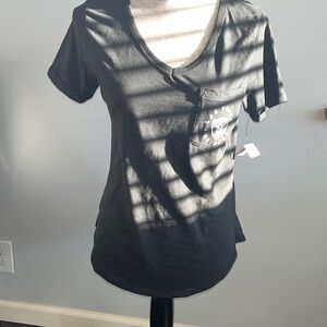 LAS VEGAS RAIDERS
WOMENS SS POCKET T-SHIRT size medium